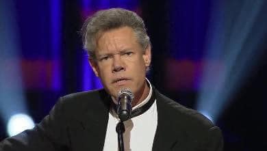 Three years after suffering a massive stroke, country music legend Randy Travis made a poignant return to the stage with a deeply emotional rendition of “Amazing Grace” in tribute to another country icon, George Jones.