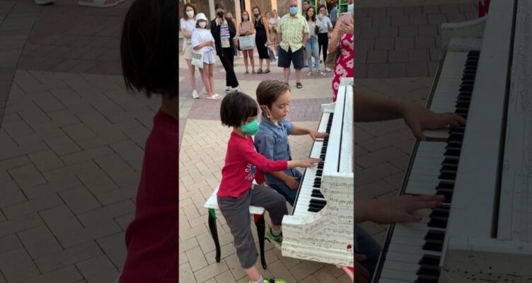 Two six-year-olds steal the spotlight with their incredible piano skills in a viral video captured at a public piano.